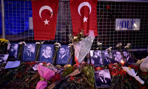 Flowers and pictures of the victims