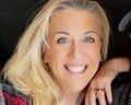 Becky Drury, a teacher wounded in a shooting, smiles resting her chin on her hand