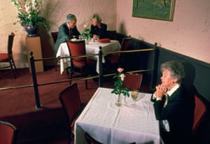A Rose And Wine from the artist’s ‘DINING ALONE In the Company of Solitude’ book and series spanning over three decades. Scherl uses the restaurant backdrop and diners for her metaphor for being alone in public.
