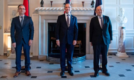 German foreign minister Heiko Maas, Britain’s foreign secretary Dominic Raab and French foreign minister Jean-Yves le Drian pose for a photograph at Chevening House, Sevenoaks.