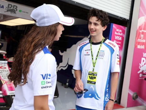Part-time Bob Dylan impersonator Timothée Chalamet chats before the race.