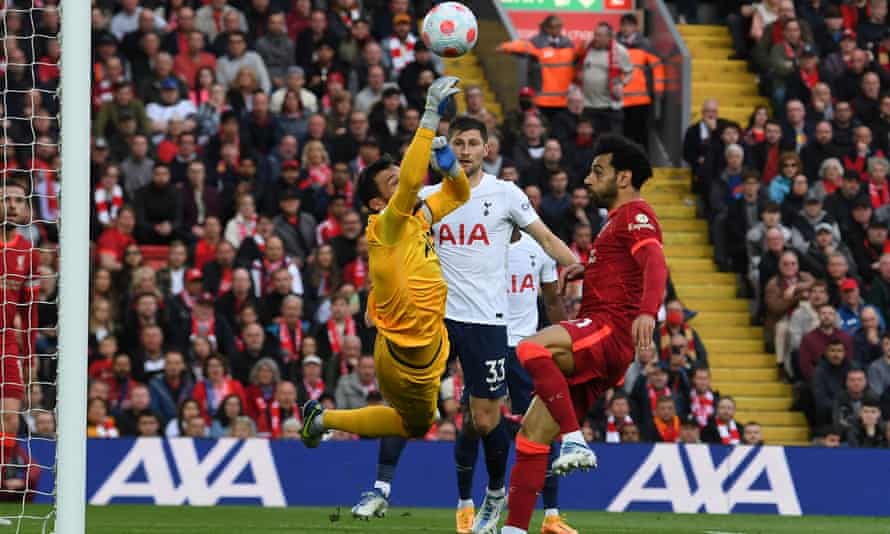Hugo Lloris manages to push the ball away from the Liverpool’s Mohamed Salah.