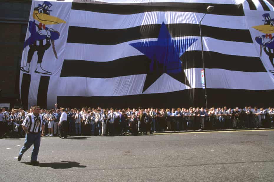 Newcastle fans wait outside St. James’ Park to greet Asprilla.