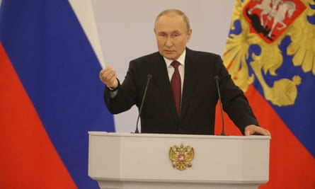 Putin speaks at the ceremony in Moscow on Friday.