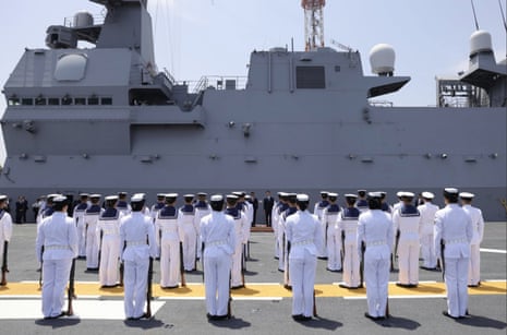Rishi Sunak visiting a Japanese naval vessel at the Yokosuka base today.
