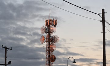 A communications tower is seen at sunset in NSW