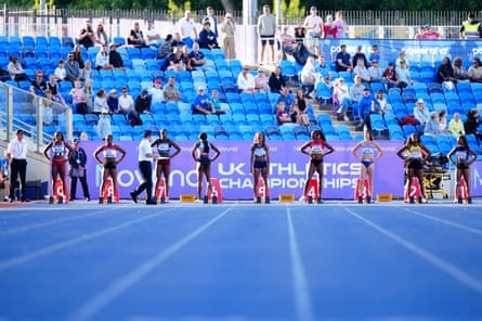 Daryll Neita leaves the track after being disqualified in the women’s 100m final