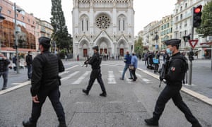 Gendarmes secure the area around the cathedral in Nice on 31 October.