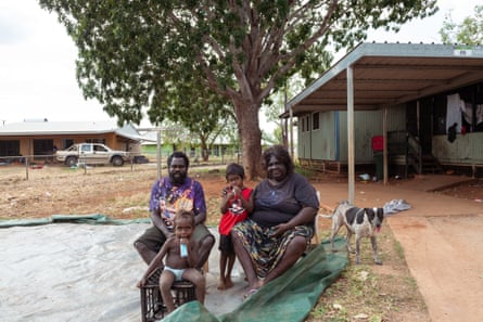 Olivia Raymond and her husband Peter and sons Jaykon, 6 and Alfred, 2 seen outside of their home at Binjari community, 18 kilometres west of Katherine.