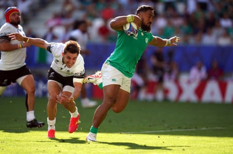Bundee Aki on his way to scoring his second and Ireland’s 11th try against Romania.