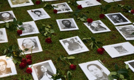 View of pictures of persons who were killed or went missing during the 1964-1985 dictatorship, during a demonstraation on the 58th anniversary of the military coup at Ibirapuera Park, in São Paulo on 31 March 2022.