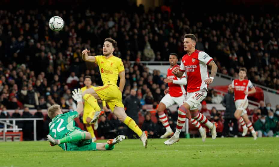 Diogo Jota lifts the ball over Aaron Ramsdale to score his and Liverpool’s second goal at the Emirates.