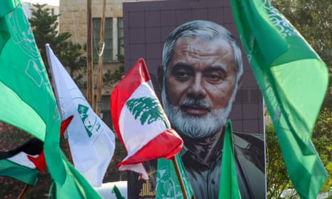 A portrait of Ismail Haniyeh is displayed during a a demonstration denouncing his killing in the Lebanese coastal city of Sidon.