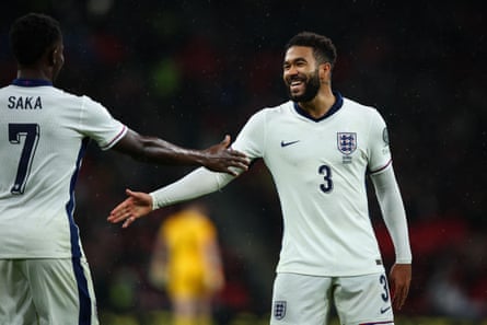 Reece James greets Bukayo Saka