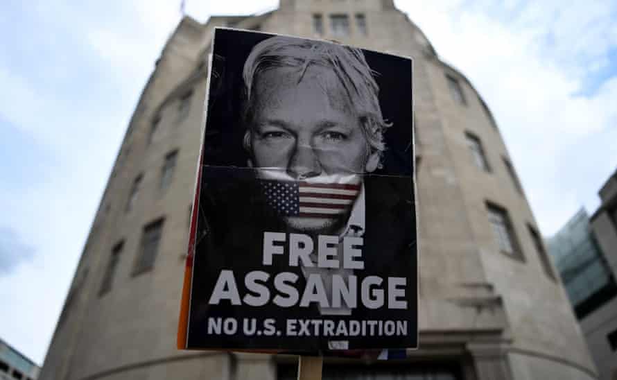 A protester demonstrates against Julian Assange’s extradition to the US in central London on 18 June.