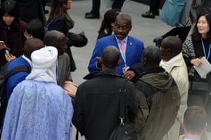 Members of an African country’s delegation chat at the conference