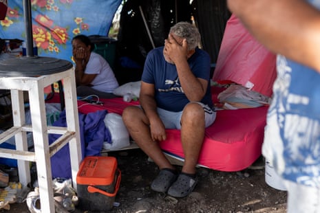 Adolfo Guedes in his makeshift shelter