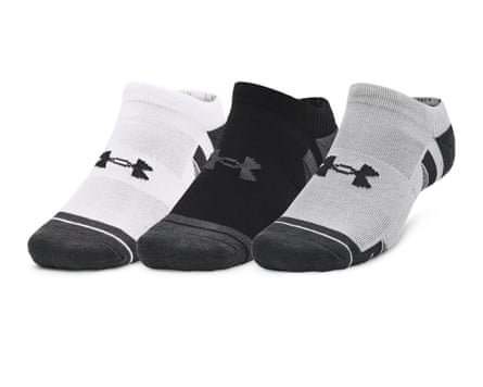 Under Armour Performance Tech trainer socks. One white, one black, one grey sock. Each sock has a logo on top of the foot.