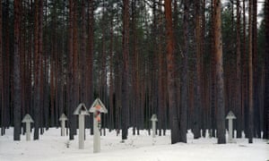 Wooden posts at Sandormokh with photographs and names of victims