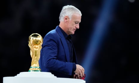 Didier Deschamps walks past the World Cup trophy after France’s penalty shootout defeat to Argentina in the final last month