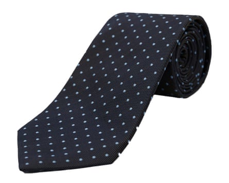 A navy Gieves & Hawkes tie with light grey pin dots.