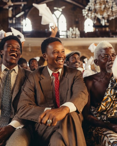 A group of men laughing in church