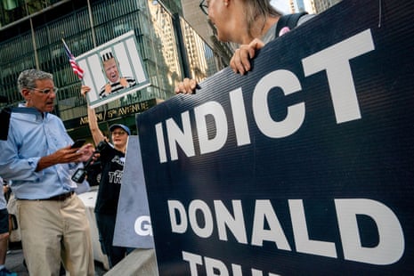 Protesters outside Trump Tower in New York City, calling for the former president’s arrest.
