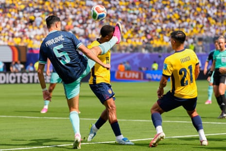 Germany's Aleksandar Pavlovic kicks Ecuador's Pedro Vite in the head.