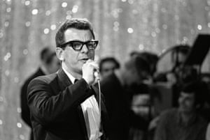 Barry Cryer performing in front of the studio audience of The David Frost Programme in May 1968, likely the warm-up act for the live show
