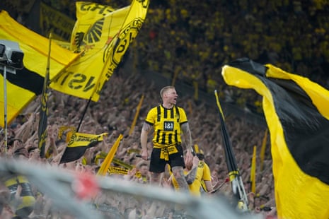 Dortmund's fans cheer for their team during the Champions League semi-final first leg against Paris Saint-Germain.