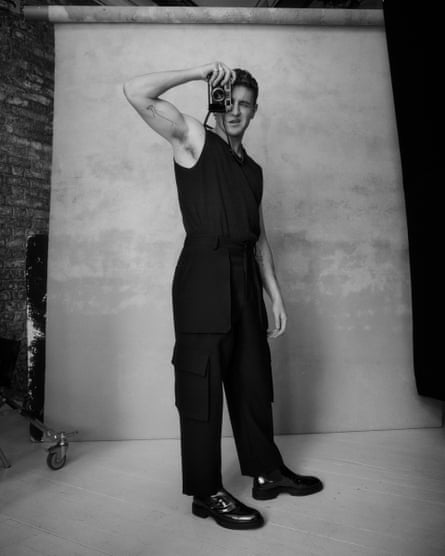 Mescal in a black vest.