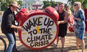 Protesters demonstrate in front of the White House after the US president, Donald Trump, announced his decision to withdraw from the Paris climate accord.