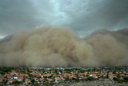 A giant dust storm approaches Phoenix, Arizona.