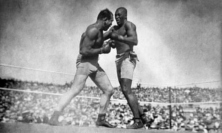 Jack Johnson defeats Jim Jeffries in 1910.