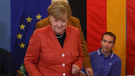 Angela Merkel holds on to power in German election – video