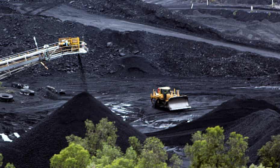 Coal is stockpiled at an open cut mine in Bowen, Queensland