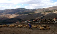 A shepherd grazes his sheep in southern Lebanon, near the frontier with Israel