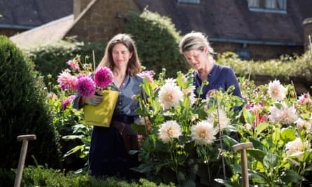 Henrietta Courtauld and Bridget Elworthy make compost at Wardington Manor near Banbury, Oxfordshire.
