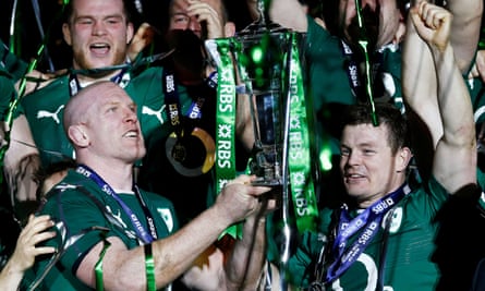 Ending on a high: O’Driscoll (right) and Paul O’Connell lift the Six Nations trophy after clinching the title in Paris in his final game for Ireland in 2014.