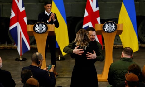 Ukraine’s President Volodymyr Zelenskiy hugs a BBC Ukraine journalist, during a news conference with British Prime Minister Rishi Sunak at a military facility in Lulworth, Dorset in southern England.