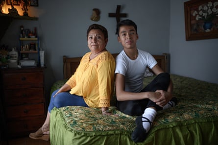 Young dancer Aaron de Jesus Marquez at home with his grandmother