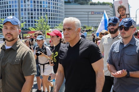 Yair Lapid in a black T-shirt
