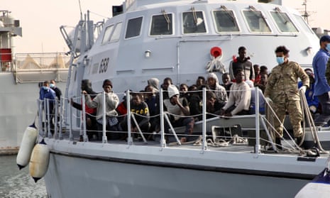 Immigrants on a Libyan coastguard ship in Tripoli.