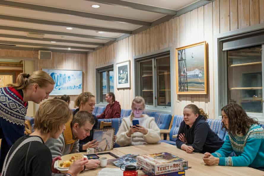 Students playing a board game