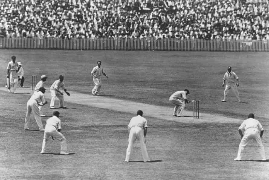 W M Woodfull of Australia ducks to avoid a rising ball from Harold Larwood of England.