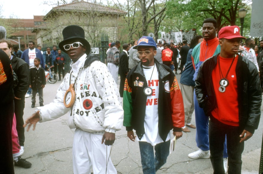 Spike Lee (centre) with Public Enemy’s Flavor Flav (left) and Chuck D (right) filming the video for Fight The Power in New York in 1989.