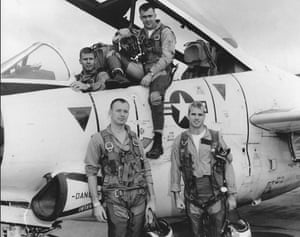 John McCain with Squadron members and a North American T-2 “Buckeye”.