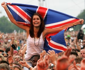 The crowd sings along with Snoop Dogg at the Live 8 concert in Hyde Park in London in 2005.