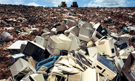 Computers dumped on landfill site: the safe disposal of electronic rubbish like computers which will contaminate the earth land fill computer