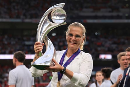 Sarina Wiegman poses with the trophy after England won the Women's Euro 2022 final against Germany.